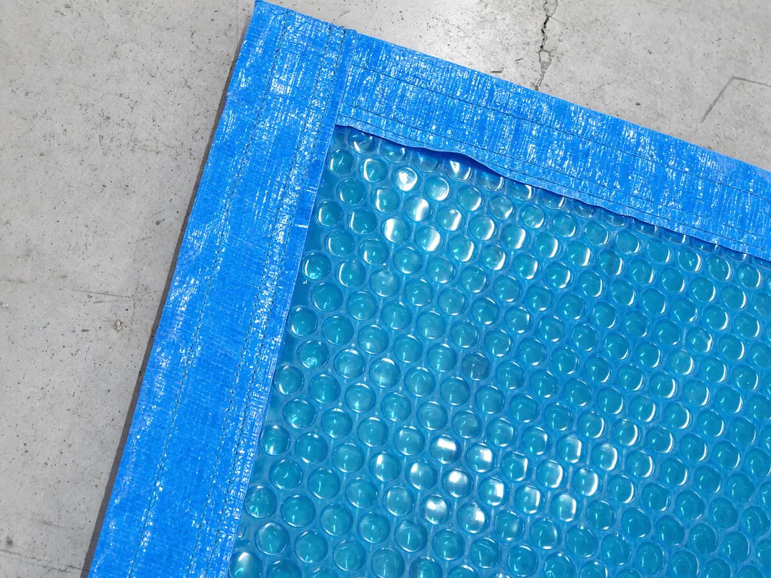 Close-up of the single bubble and the sewn hem of a summer cover