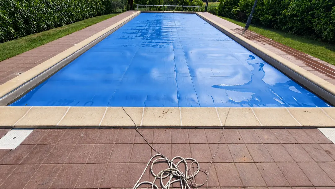 Summer foam cover laid over a rectangular pool